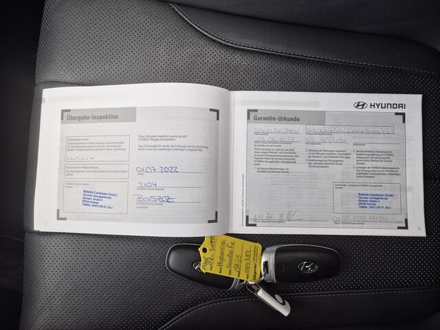 Hyundai SANTA FE 1.6 T-GDI PHEV Plug-in Premium Automaat / Apple Carplay Android Auto / Adaptief CC / Achteruitrijcamera / Stuur- Stoel en Achterbankverwarming / Elektrische achterklep / Trekgewicht 1350 / Climate control / kg /