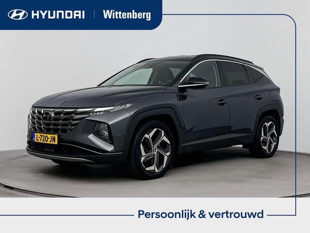 Hyundai TUCSON 1.6 T-GDI HEV Premium | Navi | Cruise Control | Climate Control | Leder | Stoel verwarming en verkoeling | Apple carplay & Android auto |