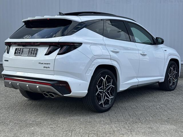 Hyundai TUCSON 1.6 T-GDI PHEV N Line Sky 4WD / Dealer onderhouden / Glazen schuif- en kanteldak / Stuur-, stoel- en achterbankverwarming / Trekgewicht 1350 kg / Stoelventilatie / Adaptief CC /
