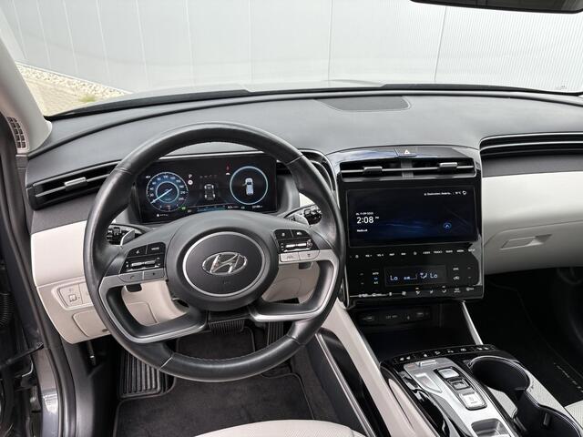 Hyundai TUCSON 1.6 T-GDI PHEV Premium Sky 4WD / Elektrisch glazen panorama-dak/ Kunstlederen bekleding / Apple Carplay/Android Auto/ Stoelverwarming Voor en Achter/