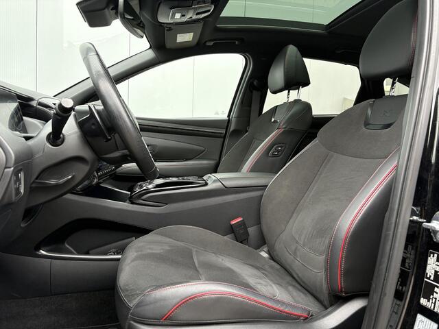 Hyundai TUCSON 1.6 T-GDI HEV N Line Sky / Trekhaak (1650kg) / Elektrisch glazen panorama-dak / Kunstlederen/suede bekleding / Stoelverwarming voor/achter / All-season banden /