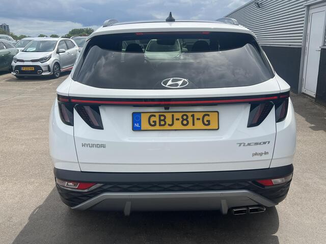 Hyundai TUCSON 1.6 T-GDI PHEV Premium Sky Edition 4WD Hyundai Tucson 1.6 T-GDI PHEV Premium Sky 4WD Schuif/kanteldak, Navigatie, Stoelverwarming, Parkeersensoren voor + Achter, Dodehoekdetectie, Climate control, BTW-Auto