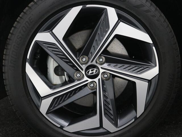 Hyundai TUCSON 1.6 T-GDI PHEV Premium 4WD AUTOMAAT /Trekhaak / 1ste Eigenaar / NL auto / Dealer onderhouden / Navigatie / Lederen bekleding / Stoelverwarming Voor & Achter / Adaptieve Cruise Control /