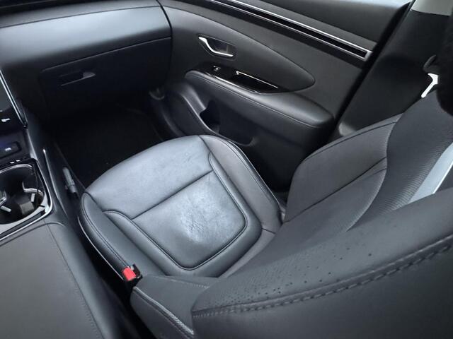 Hyundai TUCSON 1.6 T-GDI HEV Premium Sky Eerste eigenaar/ Dealer onderhouden / Glazen schuif- en kanteldak / Trekgewicht 1650 Kg/ Trekhaak / Elektrische achterklep / Adaptief cruise control / Stuur- en Stoelverwarming / Stoelventilatie /