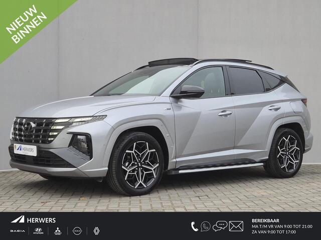 Hyundai TUCSON 1.6 T-GDI 230pk HEV N Line Sky Automaat / Fabrieksgarantie tot 04-2029 / 1600kg Trekgewicht / Panoramadak / Elektrische Stoelen met Memory / elektrisch glazen panorama-dak / Rondomzicht camera / Stuur-, Stoel en Achterbank verwarming /