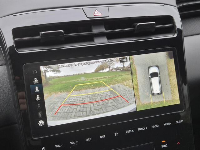 Hyundai TUCSON 1.6 T-GDI 230pk HEV N Line Sky Automaat / Fabrieksgarantie tot 04-2029 / 1600kg Trekgewicht / Panoramadak / Elektrische Stoelen met Memory / elektrisch glazen panorama-dak / Rondomzicht camera / Stuur-, Stoel en Achterbank verwarming /