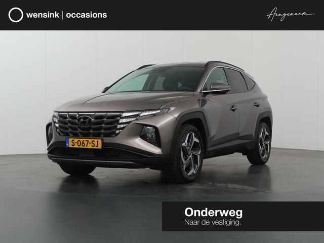 Hyundai TUCSON 1.6 T-GDI HEV Premium | Trekhaak | Lederen bekleding | Ele.verstelbare stoelen + geheugen | Stoel/Stuur verwarming | Navigatie | DAB | 360 Camera | Apple CarPlay/Android Auto | Stoelkoeling | Adaptieve Cruise Control | Krell Audio |
