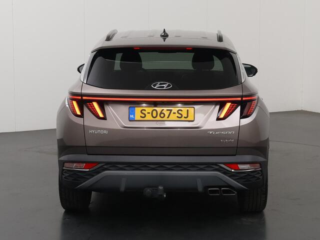 Hyundai TUCSON 1.6 T-GDI HEV Premium | Trekhaak | Lederen bekleding | Ele.verstelbare stoelen + geheugen | Stoel/Stuur verwarming | Navigatie | DAB | 360 Camera | Apple CarPlay/Android Auto | Stoelkoeling | Adaptieve Cruise Control | Krell Audio |