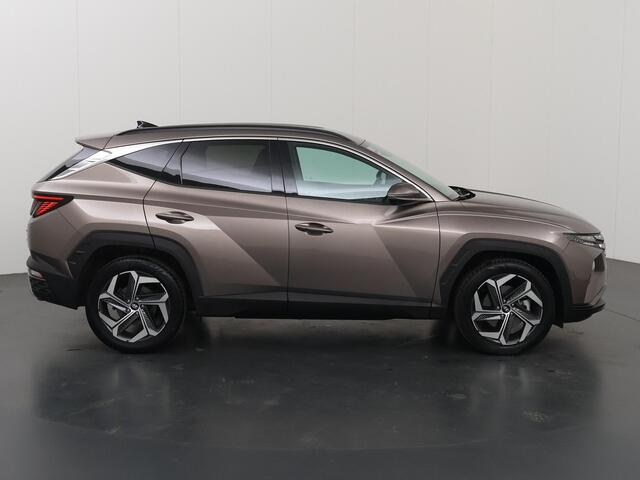 Hyundai TUCSON 1.6 T-GDI HEV Premium | Trekhaak | Lederen bekleding | Ele.verstelbare stoelen + geheugen | Stoel/Stuur verwarming | Navigatie | DAB | 360 Camera | Apple CarPlay/Android Auto | Stoelkoeling | Adaptieve Cruise Control | Krell Audio |