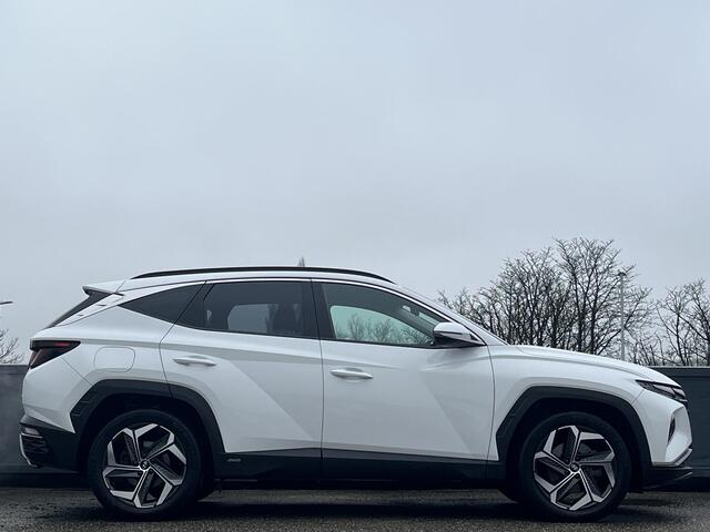 Hyundai TUCSON Comfort 1.6 T-GDI PHEV 265pk 4WD | LAGE KM-STAND! | NAVI | 19'' BI-COLOR LM-VELGEN | 4WD |