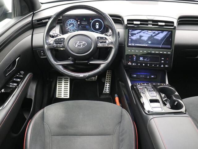 Hyundai TUCSON 1.6 T-GDI PHEV N Line Sky 4WD / Trekhaak / All Seasonbanden / Stoelverwarming & Stoelkoeling voor / Blindspot camera / SoH 100% / GROOT Glazen schuif-kanteldak / Parkeersensoren voor & achter / Historie aanwezig /