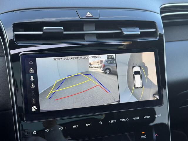 Hyundai TUCSON 1.6 T-GDI PHEV Premium Sky 4WD Automaat / Panoramadak / Dealer onderhouden / 1e eigenaar / 1.350 kg trekgewicht / Lederen Bekleding / Stoelverwarming & Stoelventilatie / Elektr. Stoelen / Navigatie / Camera 360° / Adaptieve Cruise / Apple Carplay/Android 