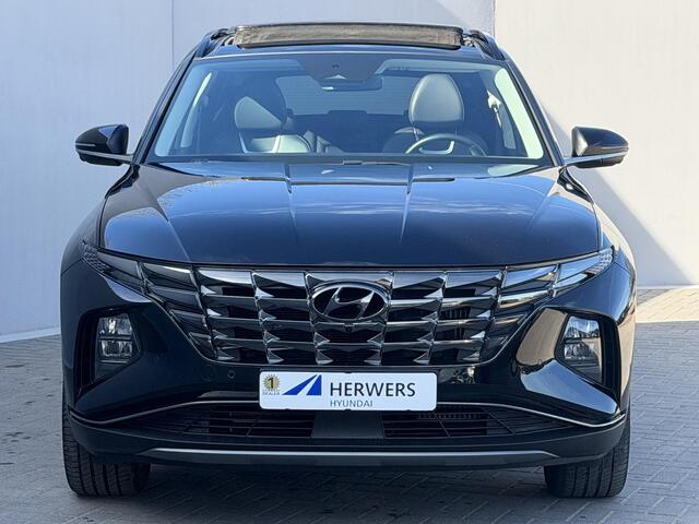 Hyundai TUCSON 1.6 T-GDI PHEV Premium Sky 4WD Automaat / Panoramadak / Dealer onderhouden / 1e eigenaar / 1.350 kg trekgewicht / Lederen Bekleding / Stoelverwarming & Stoelventilatie / Elektr. Stoelen / Navigatie / Camera 360° / Adaptieve Cruise / Apple Carplay/Android 