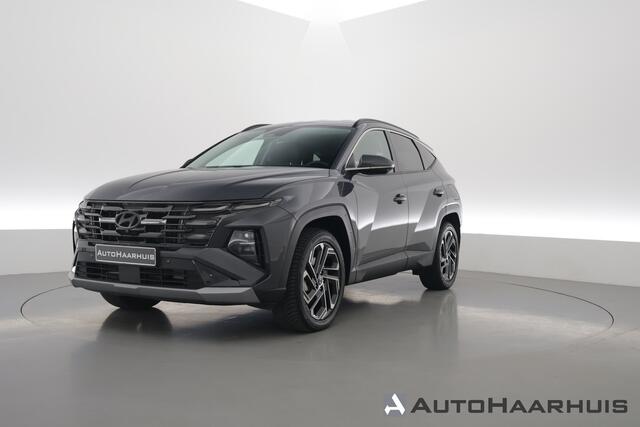 Hyundai TUCSON 1.6 T-GDI PHEV Premium (Facelift) | Rijklaar! | Widescreen | HUD | Stoelventilatie | Memory | 360*+PDC | Stuur-Stoelverw. | Nav+App.Connect | Elek. Klep | v