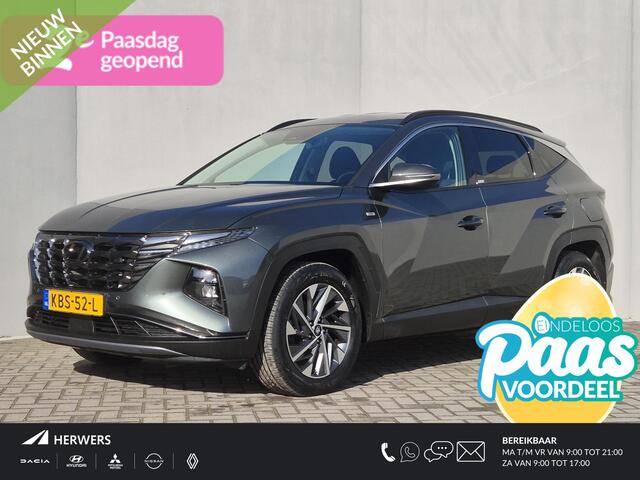 Hyundai TUCSON 1.6 T-GDI MHEV Comfort Smart Handgeschakeld / Fabrieksgarantie tot 01-2027 / Dealer onderhouden / Elektrische klep / Stuur- en stoelverwarming / Apple Carplay Android / Navigatie / Trekgewicht 1.650 kg / Achteruitrijcamera / Draadloze telefoon lader / Cru