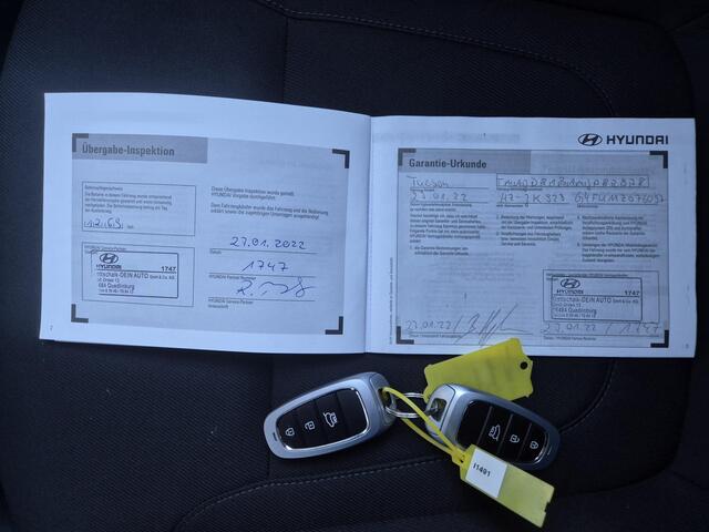 Hyundai TUCSON 1.6 T-GDI MHEV Comfort Smart Handgeschakeld / Fabrieksgarantie tot 01-2027 / Dealer onderhouden / Elektrische klep / Stuur- en stoelverwarming / Apple Carplay Android / Navigatie / Trekgewicht 1.650 kg / Achteruitrijcamera / Draadloze telefoon lader / Cru