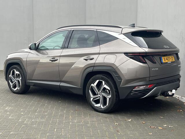 Hyundai TUCSON 1.6 T-GDI PHEV Comfort Smart 4WD / Vaste Trekhaak 13-polig (Trekgewicht 1.350kg) / Achteruitrijcamera / Stuur- en Stoelverwarming / Climate Control / Adaptieve Cruise Control / Apple Carplay & Android Auto / Keyless Entry & Start / Navigatie full map / E