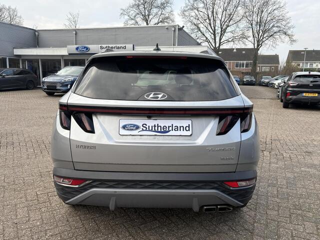 Hyundai TUCSON 1.6 T-GDI HEV Premium Sky | Panoramadak | Afneembare trekhaak | Stoelverwarming/koeling | Camera