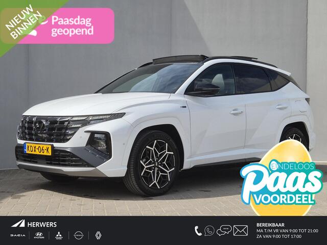 Hyundai TUCSON 1.6 T-GDI PHEV N Line Sky 4WD automaat / Dealer onderhouden / Fabrieksgarantie tot 02-2027 / Glazen schuif- en kanteldak / Trekgewicht 1350 kg / EAER bereik 62 km bereik stad 74 km / Elektrische achterklep / Stuur- Stoel & Achterbankverwarming / Stoelvent