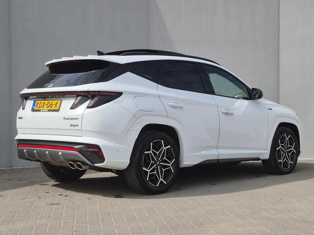 Hyundai TUCSON 1.6 T-GDI PHEV N Line Sky 4WD automaat / Dealer onderhouden / Fabrieksgarantie tot 02-2027 / Glazen schuif- en kanteldak / Trekgewicht 1350 kg / EAER bereik 62 km bereik stad 74 km / Elektrische achterklep / Stuur- Stoel & Achterbankverwarming / Stoelvent