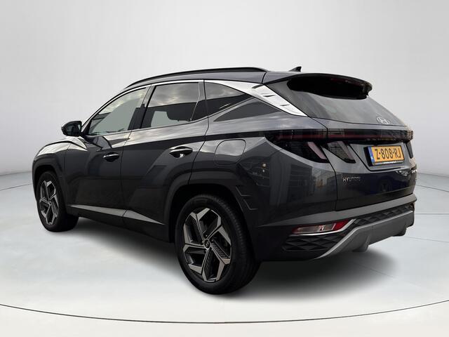 Hyundai TUCSON 1.6 T-GDI PHEV Premium 4WD | Lederen bekleding | Stoel- en stuurverwarming | 4WD | Navigatiesysteem | Climate Control | Adaptieve Cruise Control | Plug Inn hybride | Full options | Resterende fabrieksgarantie | Rijklaarprijs |