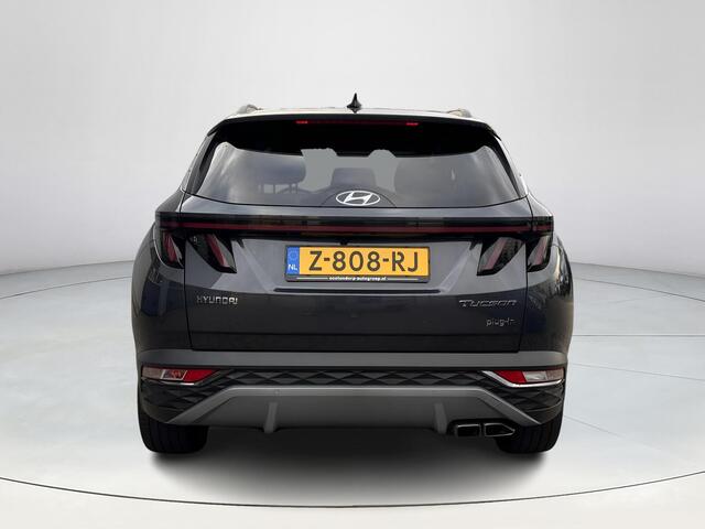 Hyundai TUCSON 1.6 T-GDI PHEV Premium 4WD | Lederen bekleding | Stoel- en stuurverwarming | 4WD | Navigatiesysteem | Climate Control | Adaptieve Cruise Control | Plug Inn hybride | Full options | Resterende fabrieksgarantie | Rijklaarprijs |