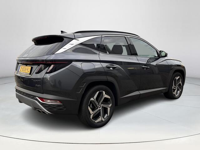 Hyundai TUCSON 1.6 T-GDI PHEV Premium 4WD | Lederen bekleding | Stoel- en stuurverwarming | 4WD | Navigatiesysteem | Climate Control | Adaptieve Cruise Control | Plug Inn hybride | Full options | Resterende fabrieksgarantie | Rijklaarprijs |