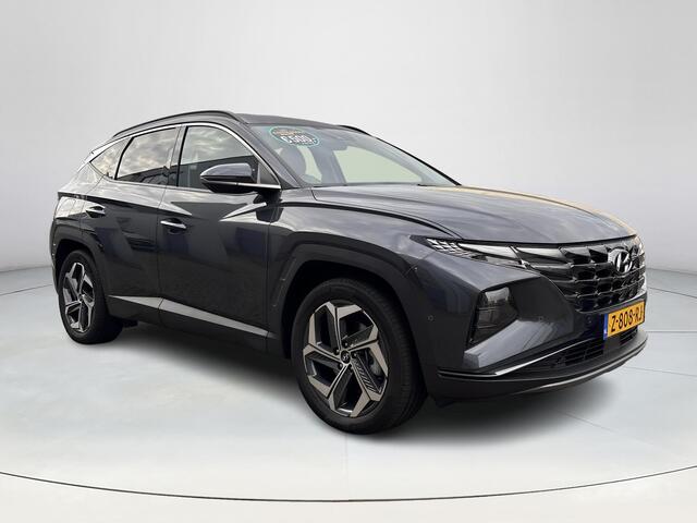 Hyundai TUCSON 1.6 T-GDI PHEV Premium 4WD | Lederen bekleding | Stoel- en stuurverwarming | 4WD | Navigatiesysteem | Climate Control | Adaptieve Cruise Control | Plug Inn hybride | Full options | Resterende fabrieksgarantie | Rijklaarprijs |