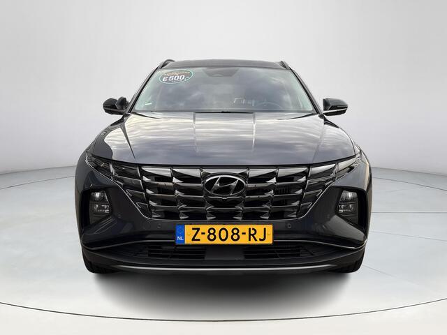 Hyundai TUCSON 1.6 T-GDI PHEV Premium 4WD | Lederen bekleding | Stoel- en stuurverwarming | 4WD | Navigatiesysteem | Climate Control | Adaptieve Cruise Control | Plug Inn hybride | Full options | Resterende fabrieksgarantie | Rijklaarprijs |