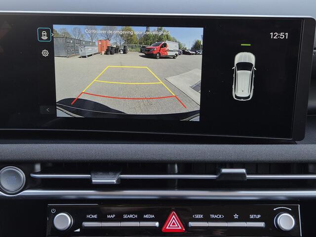 Hyundai TUCSON 1.6 T-GDI PHEV Premium / Facelift Model / Head Up Display / Trekgewicht 1210 kg / Elektrische achterklep / Stuur- & Stoelverwarming / Achteruitrijcamera / Adaptief cruise control / EAER bereik 68 km bereik stad 87 km / Draadloze telefoon lader / Keyless