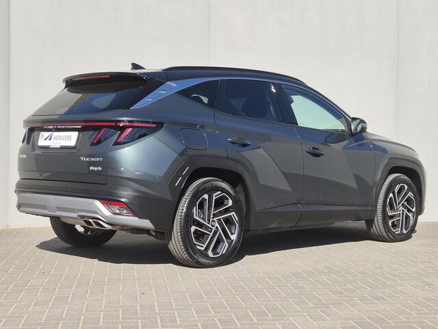 Hyundai TUCSON 1.6 T-GDI PHEV Premium / Facelift Model / Dealer onderhouden / Fabrieksgarantie tot 09-2029 / Head Up Display / Trekgewicht 1210 kg / Elektrische achterklep / Achteruitrijcamera / Draadloze telefoon lader / Apple Carplay Android Auto / Stuur- & Stoelverwa