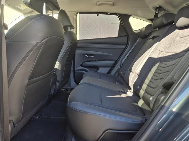 Hyundai TUCSON 1.6 T-GDI PHEV Premium / Facelift Model / Dealer onderhouden / Fabrieksgarantie tot 09-2029 / Head Up Display / Trekgewicht 1210 kg / Elektrische achterklep / Achteruitrijcamera / Draadloze telefoon lader / Apple Carplay Android Auto / Stuur- & Stoelverwa