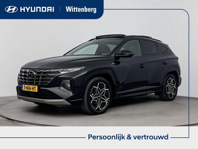 Hyundai TUCSON 1.6 T-GDI PHEV N Line Sky 4WD | Schuif/kantel dak | Achteruitrij camera | Elektrische stoelen | Dodehoek detectie | Navigatie | Stoelverwarming & verkoeling |