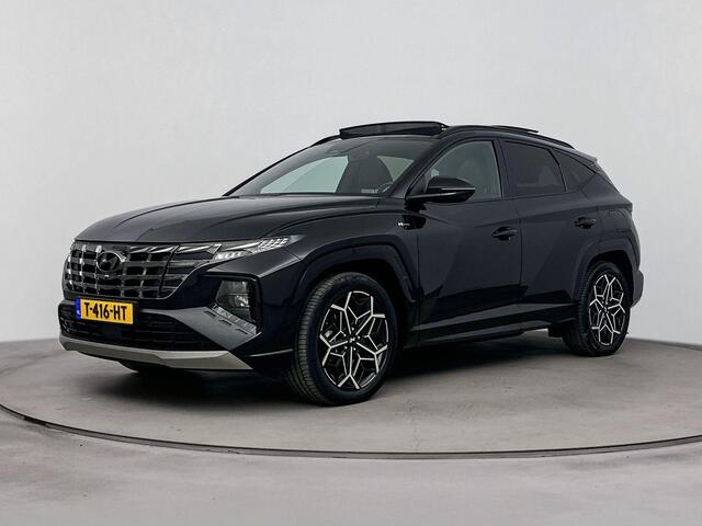 Hyundai TUCSON 1.6 T-GDI PHEV N Line Sky 4WD | Schuif/kantel dak | Achteruitrij camera | Elektrische stoelen | Dodehoek detectie | Navigatie | Stoelverwarming & verkoeling |