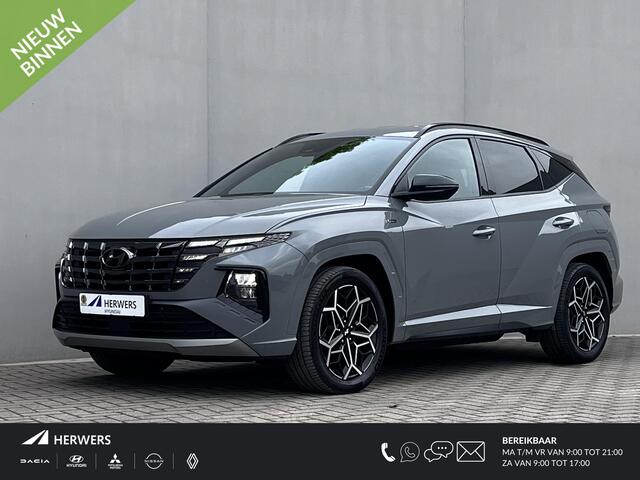 Hyundai TUCSON 1.6 T-GDI PHEV N Line Edition 4WD / Fabrieksgarantie tot 03-2027 / Dealer onderhouden / Automaat / 1.350kg afn. trekhaak / Elektrische klep / Camera / Stuur- & stoelverwarming / Navigatie / Apple Carplay Android / 19" LM wielen /