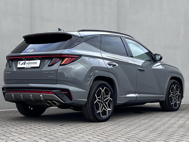 Hyundai TUCSON 1.6 T-GDI PHEV N Line Edition 4WD / Fabrieksgarantie tot 03-2027 / Dealer onderhouden / Automaat / 1.350kg afn. trekhaak / Elektrische klep / Camera / Stuur- & stoelverwarming / Navigatie / Apple Carplay Android / 19" LM wielen /