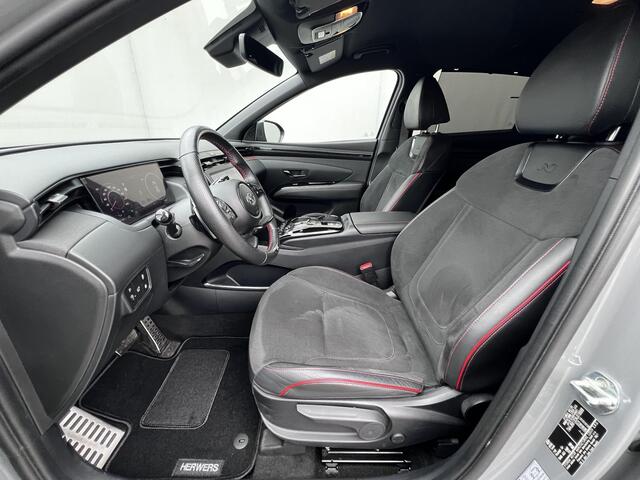 Hyundai TUCSON 1.6 T-GDI PHEV N Line Edition 4WD / Fabrieksgarantie tot 03-2027 / Dealer onderhouden / Automaat / 1.350kg afn. trekhaak / Elektrische klep / Camera / Stuur- & stoelverwarming / Navigatie / Apple Carplay Android / 19" LM wielen /