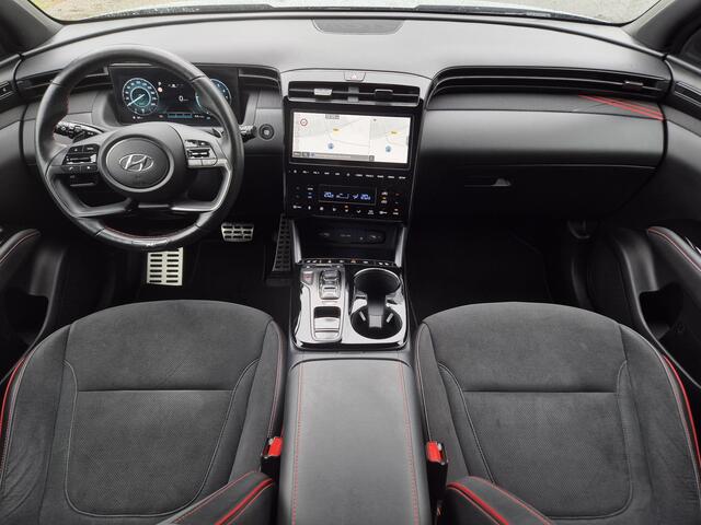 Hyundai TUCSON 1.6 T-GDI 4wd N Line Sky 4WD / Dealer onderhouden / Fabrieksgarantie tot 03-2027 / Trekhaak afneembaar / Panorama schuifdak / Trekgewicht 1650 kg / Navigatie / Apple Carplay Android / Elektrische achterklep / Stuur- Stoel & Achterbank verwarming / Rondomz