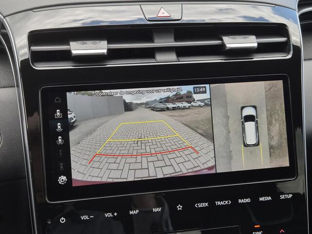 Hyundai TUCSON 1.6 T-GDI PHEV Premium Sky 4WD / Dealer onderhouden / Fabrieksgarantie tot 03-2027 / Trekgewicht 1350 kg / Trekhaak afneembaar / Glazen schuif- en kanteldak / Elektrische achterklep / Stuur- Stoel & Achterbankverwarming / Stoelventilatie / Adaptief cruise
