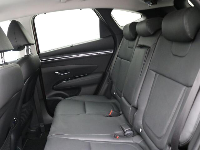 Hyundai TUCSON 1.6 T-GDI HEV Premium / Blindspot Camera / 360 Camera / Trekhaak / Bestuurdersstoel met geheugen / All season banden / 1650KG Trekgewicht / 1ste Eigenaar / NL Auto / Dealer onderhouden / Keyless Entry /