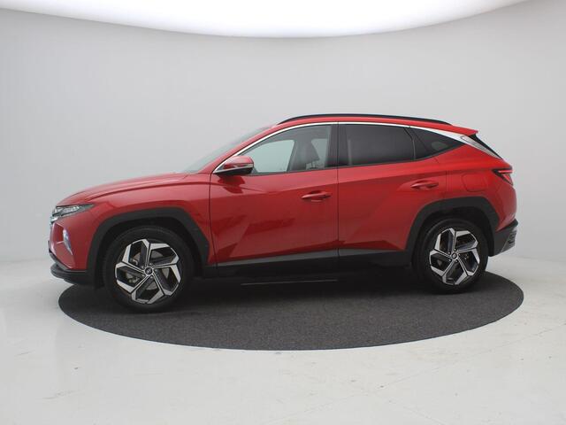 Hyundai TUCSON 1.6 T-GDI HEV Premium / Blindspot Camera / 360 Camera / Trekhaak / Bestuurdersstoel met geheugen / All season banden / 1650KG Trekgewicht / 1ste Eigenaar / NL Auto / Dealer onderhouden / Keyless Entry /
