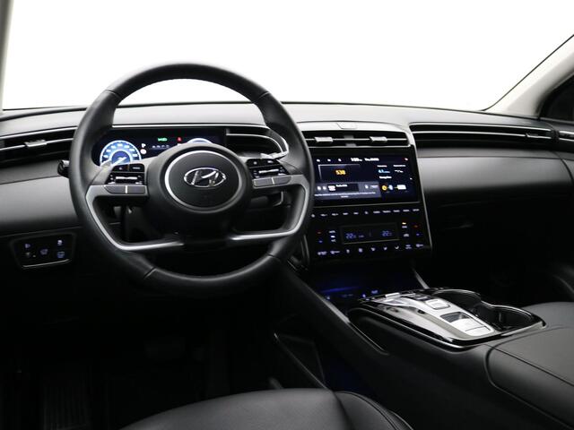 Hyundai TUCSON 1.6 T-GDI HEV Premium / Blindspot Camera / 360 Camera / Trekhaak / Bestuurdersstoel met geheugen / All season banden / 1650KG Trekgewicht / 1ste Eigenaar / NL Auto / Dealer onderhouden / Keyless Entry /