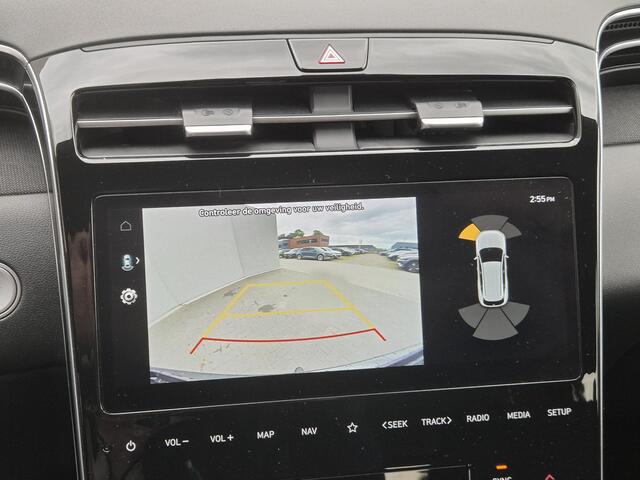 Hyundai TUCSON 1.6 T-GDI HEV Comfort Smart / Fabrieksgarantie tot 03-2027 / Dealer onderhouden / Trekhaak afneembaar / Navigatie/ Apple Carplay Android / Stuur- & Stoel verwarming / Elektrische achterklep / Achteruitrijcamera /