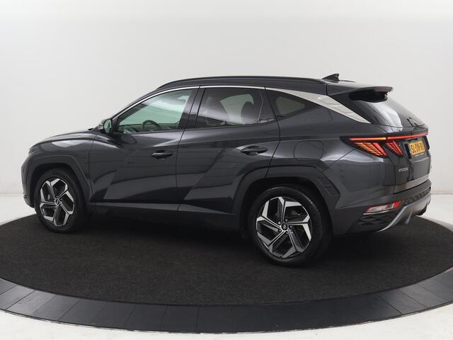Hyundai TUCSON 1.6 T-GDI PHEV Comfort 4WD | SOH 96% | Stoelverwarming | Trekhaak | Adaptive cruise | Camera | Carplay | Full LED | Navigatie | DAB | Keyless | Climate control | Plug In