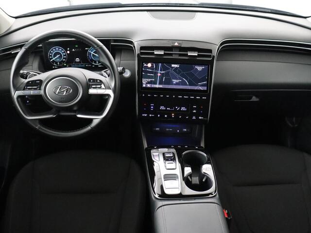 Hyundai TUCSON 1.6 T-GDI PHEV Comfort 4WD | SOH 96% | Stoelverwarming | Trekhaak | Adaptive cruise | Camera | Carplay | Full LED | Navigatie | DAB | Keyless | Climate control | Plug In