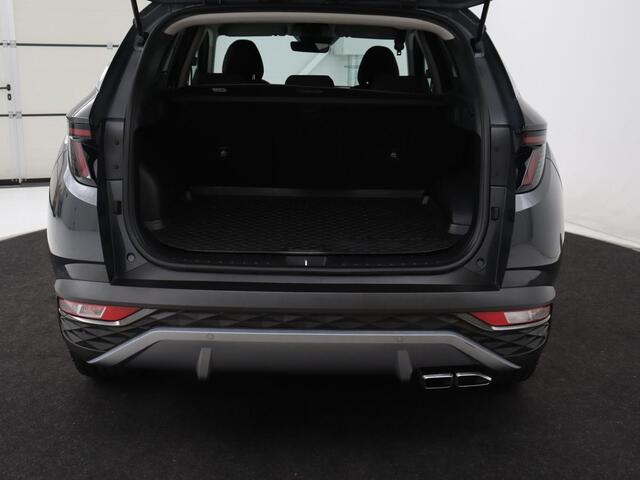 Hyundai TUCSON 1.6 T-GDI PHEV Comfort 4WD | SOH 96% | Stoelverwarming | Trekhaak | Adaptive cruise | Camera | Carplay | Full LED | Navigatie | DAB | Keyless | Climate control | Plug In