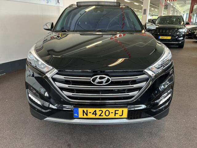 Hyundai TUCSON 1.6 T-GDi Premium 4WD Automaat | Panoramadak | Inklapbare trekhaak | Lederen bekleding | Cruise control | Stoelverwarming+verkoeling | Achteruitrijcamera | Lane assist | Dodehoeksdetectie | Stuurverwarming