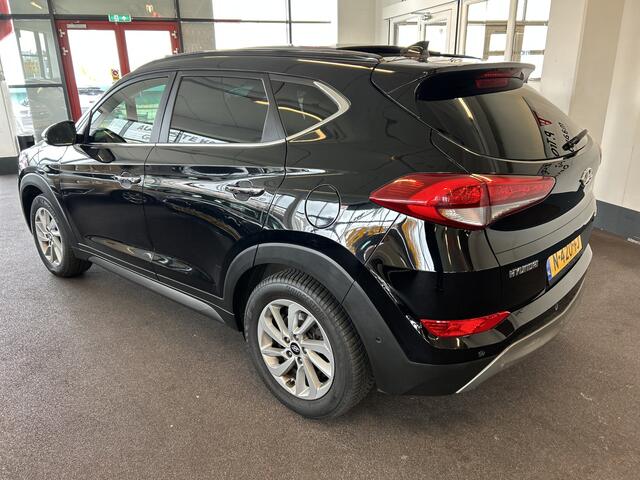 Hyundai TUCSON 1.6 T-GDi Premium 4WD Automaat | Panoramadak | Inklapbare trekhaak | Lederen bekleding | Cruise control | Stoelverwarming+verkoeling | Achteruitrijcamera | Lane assist | Dodehoeksdetectie | Stuurverwarming