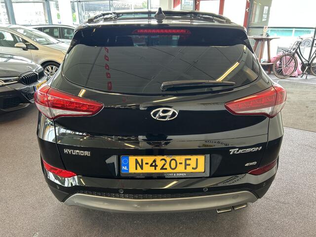 Hyundai TUCSON 1.6 T-GDi Premium 4WD Automaat | Panoramadak | Inklapbare trekhaak | Lederen bekleding | Cruise control | Stoelverwarming+verkoeling | Achteruitrijcamera | Lane assist | Dodehoeksdetectie | Stuurverwarming