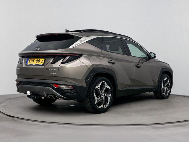 Hyundai TUCSON 1.6 T-GDI PHEV Premium Sky 4WD | Schuif kanteldak | Trekhaak 1350kg | Dodehoek detectie | Stoel verwarming & verkoeling | Navigatie |